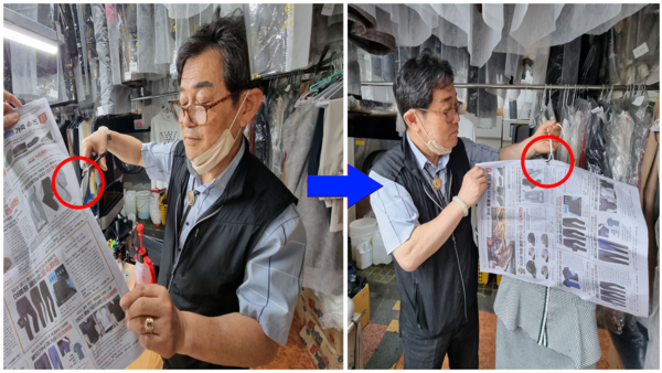 이문학 한국세탁업중앙회 춘천시지부장이 신문지를 옷걸이에 거는 시범을 보이고 있다.(사진=박준용 기자)